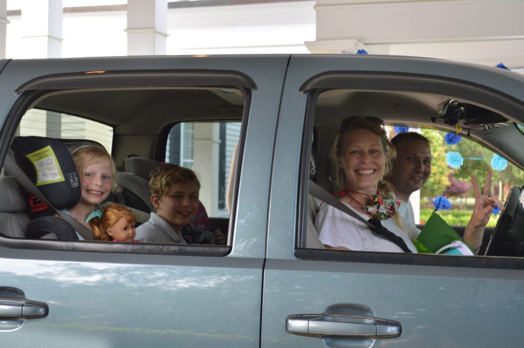 Family happily attending church event