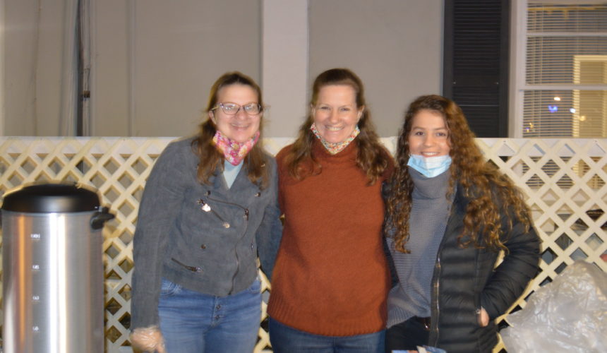 Group of three women at donation drive